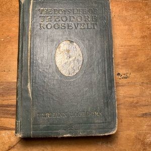 Two books : The Boys Life of Theodore Roosevelt and Plane & Solid Geometry